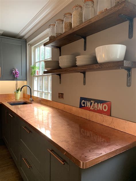 Copper kitchen - Brushed Copper Kitchen Splashback. This brushed copper kitchen splashback project certainly makes a splash. It adds warmth, character and style to a kitchen without detracting from the other amazing design elements. Copper is an excellent way to add warmth and depth to modern kitchens. That’s especially true when dealing …